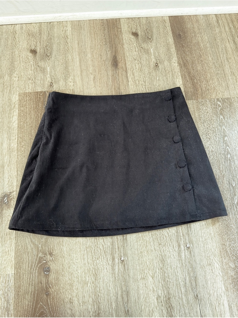 Classic Black A-Line Corduroy Mini Skirt with Side Button Detail
